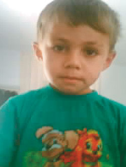 Шестилетний Рахим Амриев, погибший в результате зачистки. Фото сделано на мобильный телефон отцом мальчика